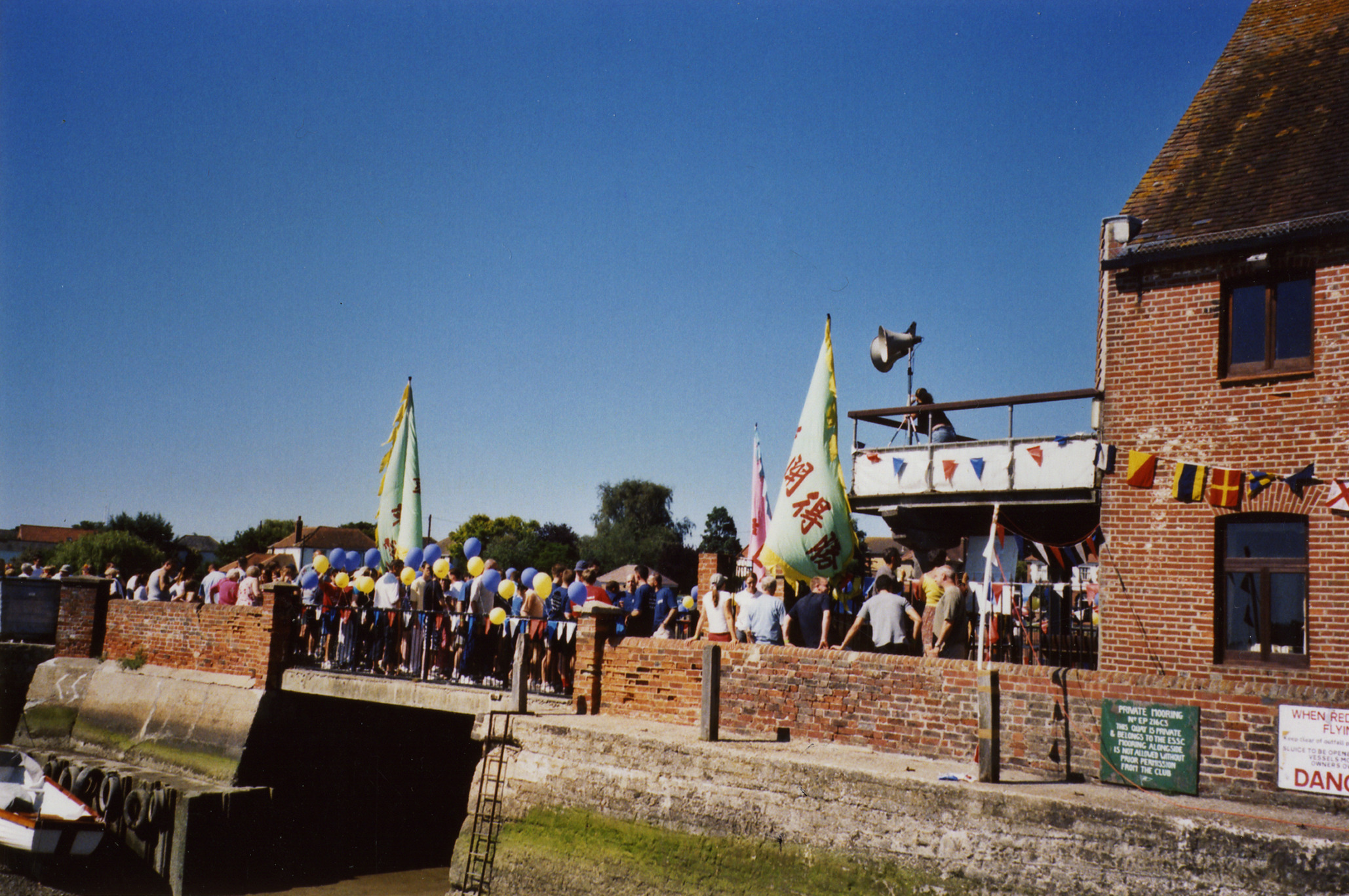 18 photographs of local events taken during 2003 covering Mile of