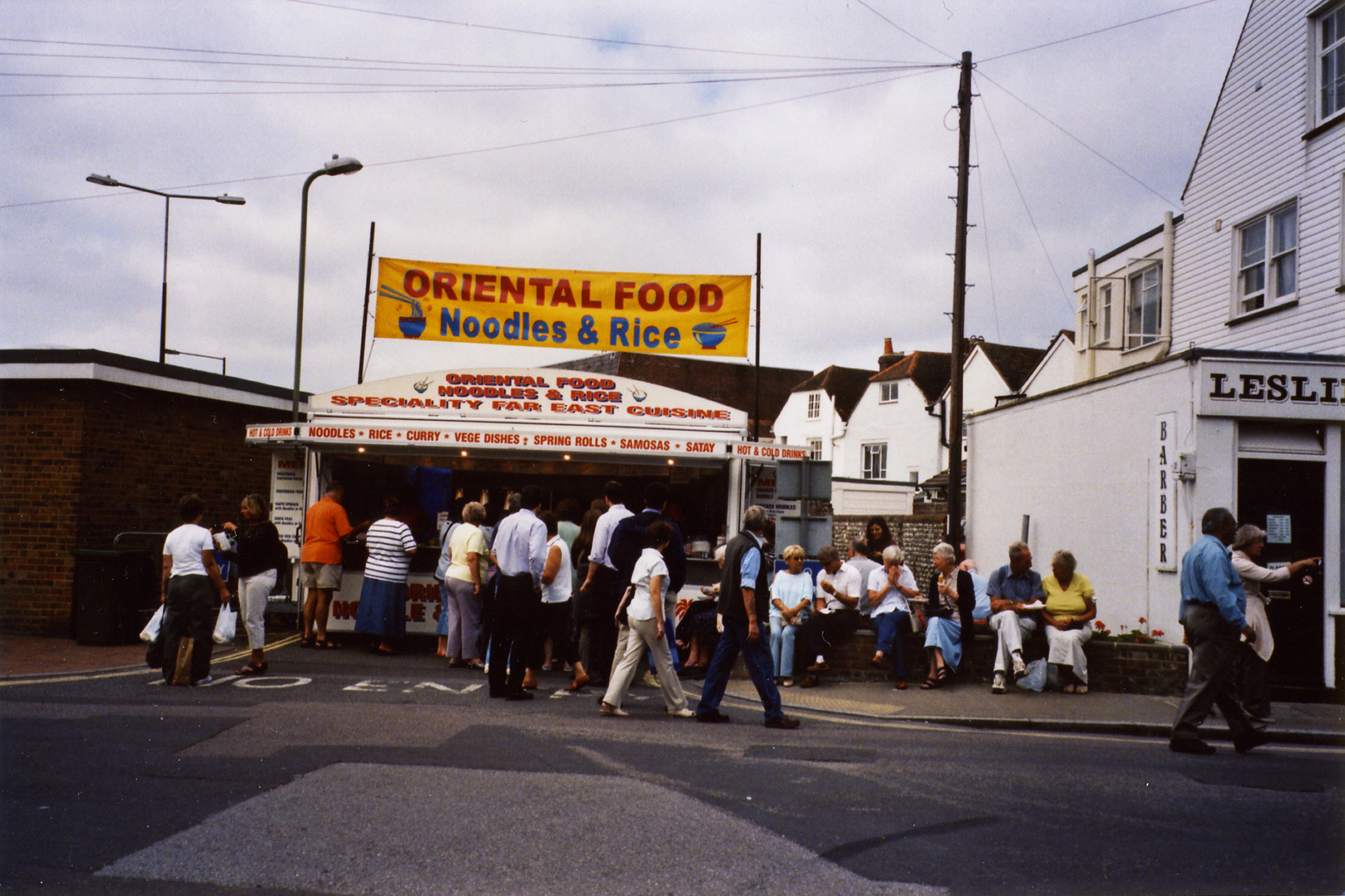 18 photographs of local events taken during 2003 covering Mile of
