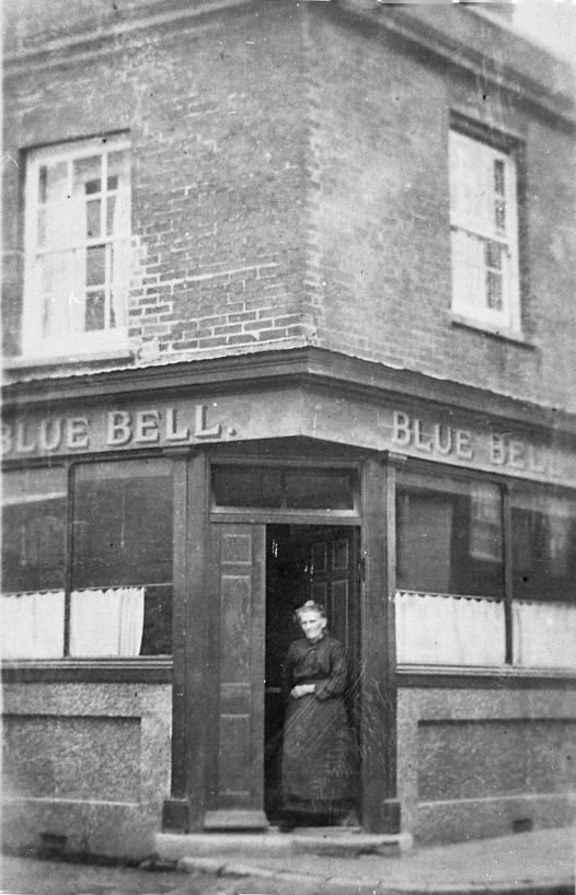 Mrs Wells at the door of the Old Blue Bell in South Street
